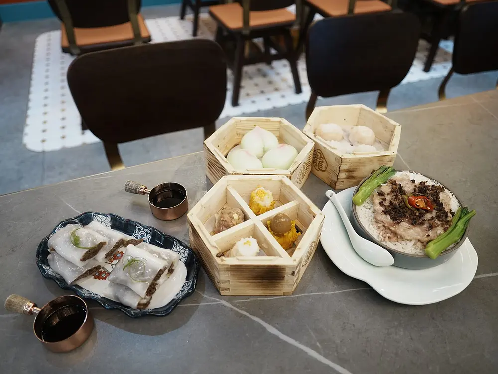 A dim sum spread with dumplings and cheung fun